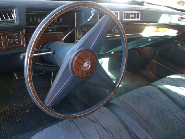 1976 white cadillac fleetwood 75