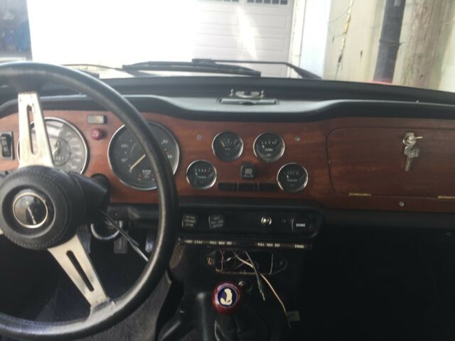 1976 triumph tr6 roadster. pimento red