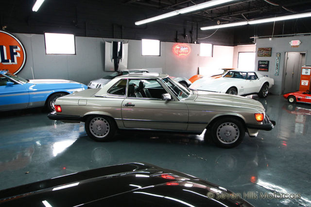 only 33,690 original miles, stunning condition, smoke silver/brown, both tops
