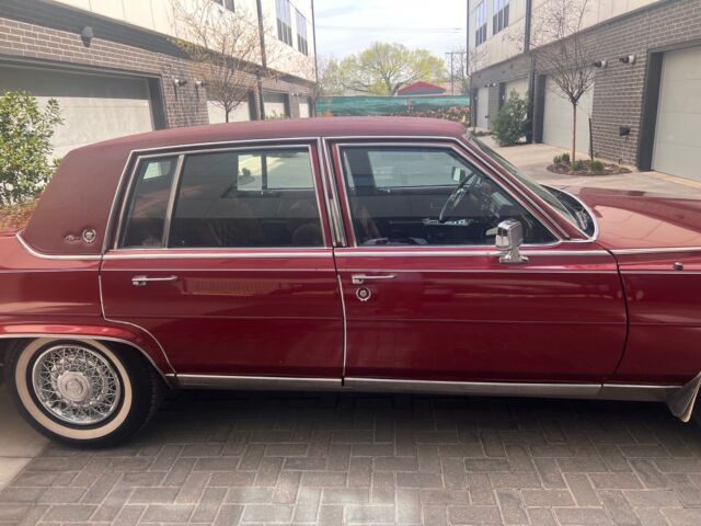 1984 cadillac fleetwood sedan red rwd automatic brougham