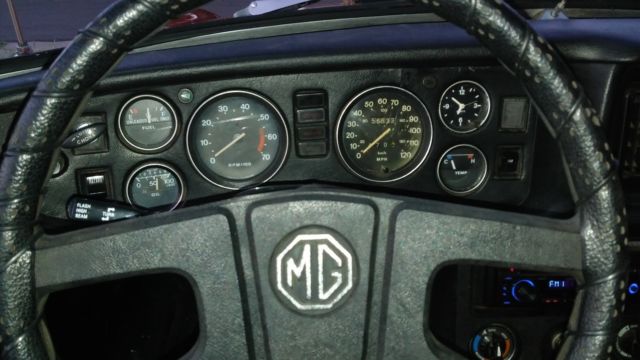 mgb - runs great - new top - new sound system - very nice