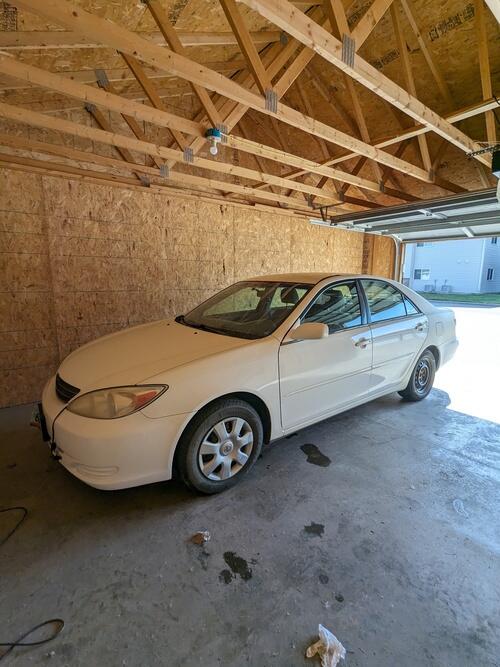 2003 toyota camry, 157,000 miles, salvage title some rear passenger side body