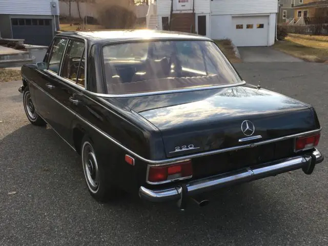 1969 mercedes benz 220 /8 sedan. 4 speed, gas. black. lots of history. original