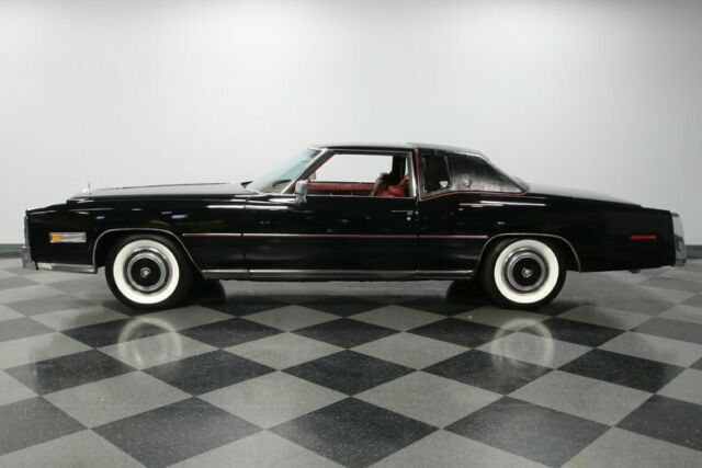 classic vintage caddy chrome black red luxury white walls tailfins
