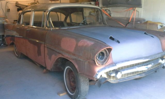 57 chevy 4dr project with xtra parts