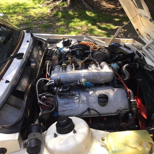 bmw classic beauty, flawless inside and out. stick shift, fun to drive, white