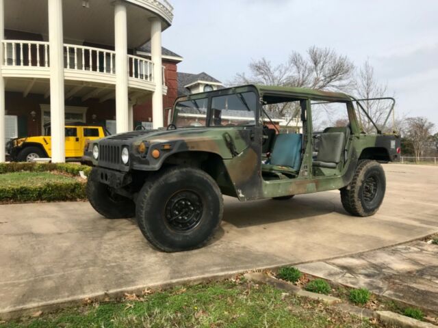 humvee hummer h1 with only 12k miles, driven across country already!