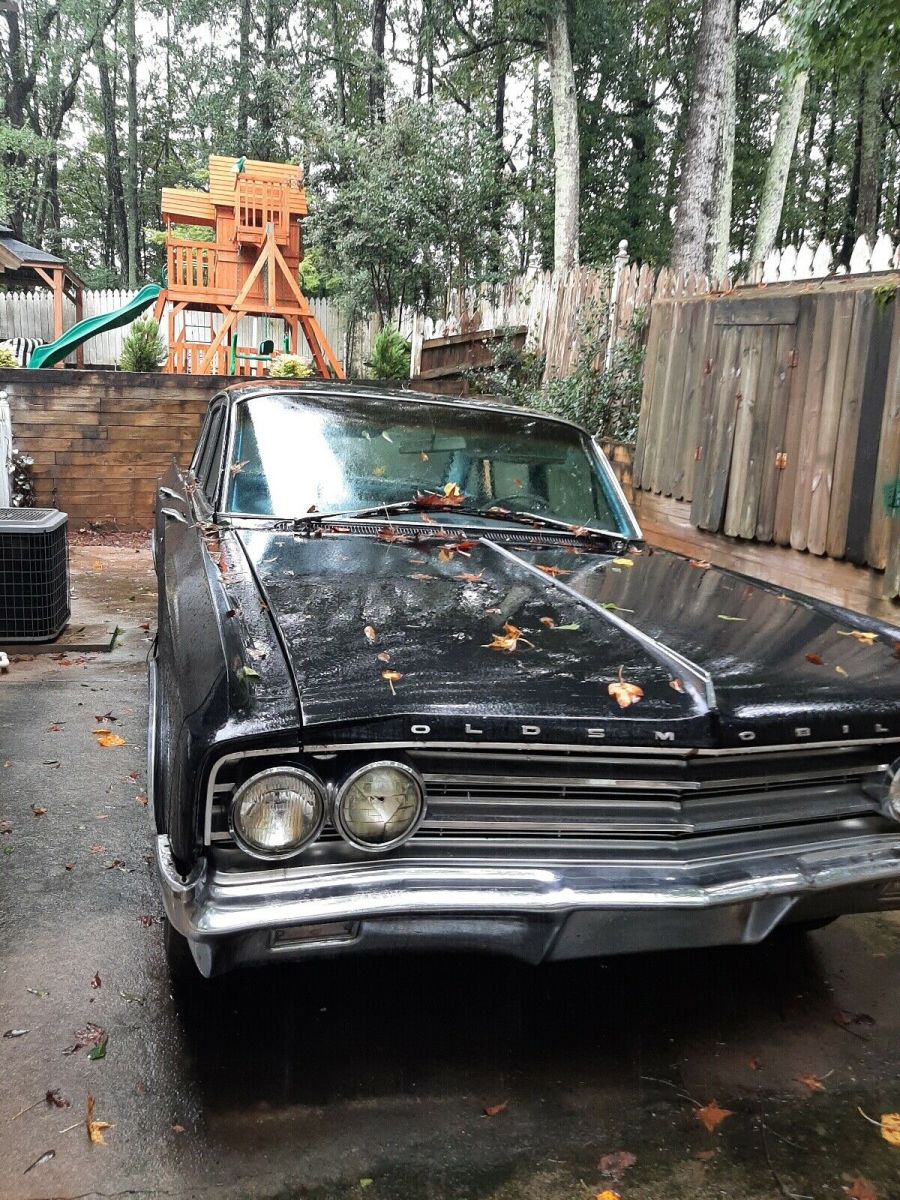 1963 oldsmobile 98 sedan black rwd automatic chrome