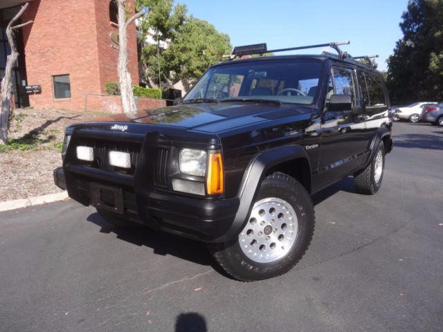 one owner, quarto track limited slip rear differential, 4.0l,5 speed manuel,4x4