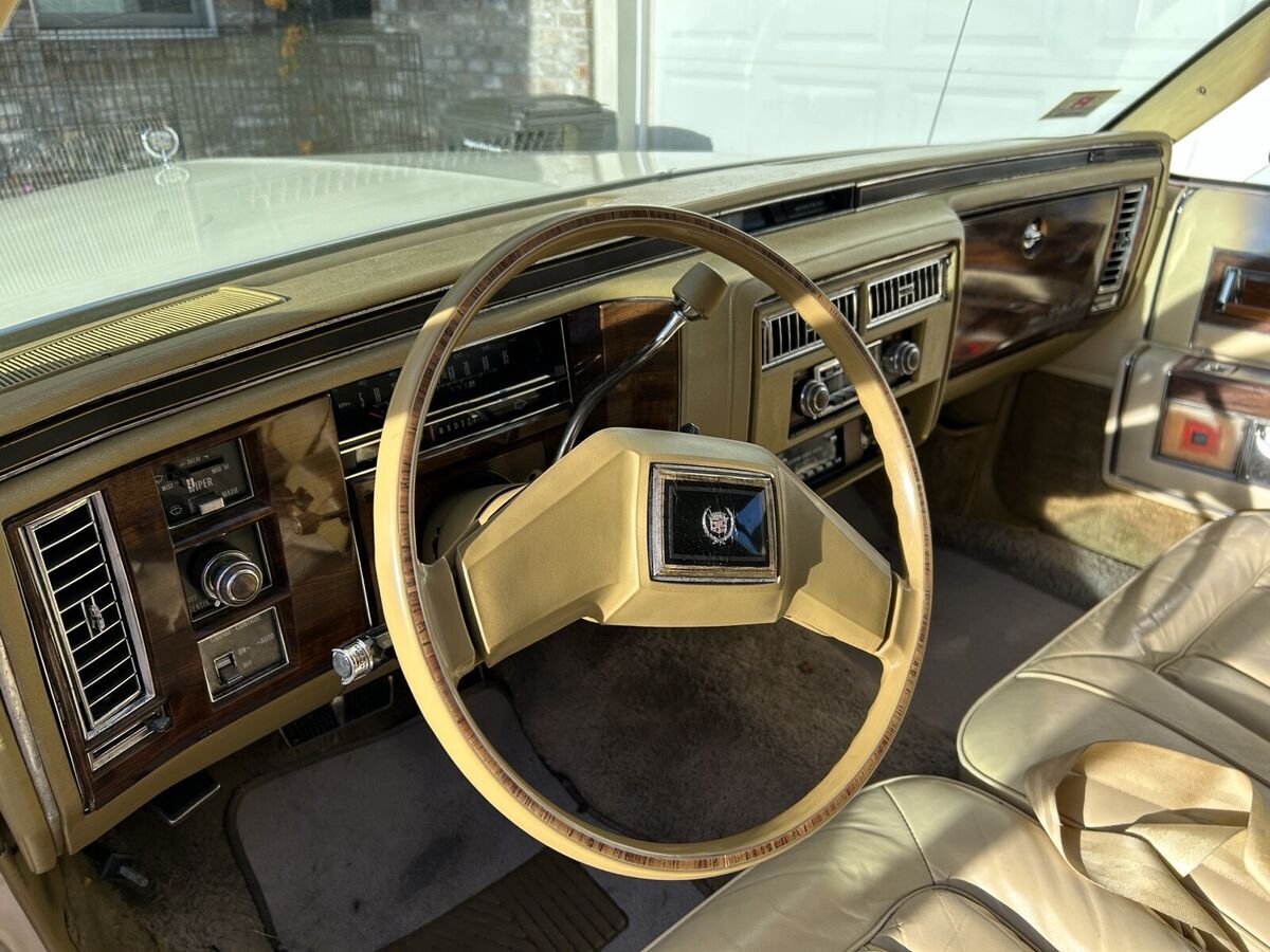 1983 cadillac fleetwood sedan yellow brougham