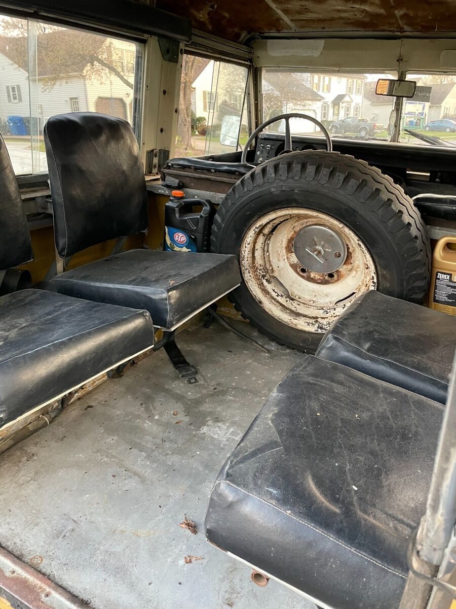 yellow 1975 land rover series 4 cylinder 4speed avail