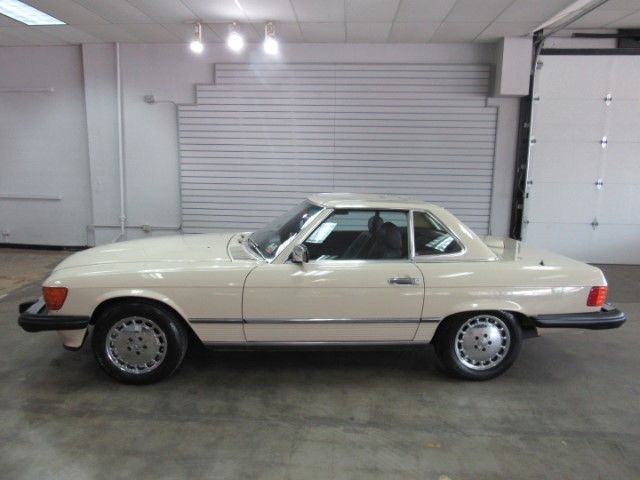 1986 mercedes-benz 560 sl 65k miles beige both tops very clean
