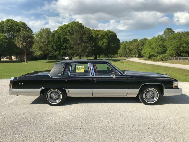 astroroof, wire wheels, 5.7 liter v8, black on red leather... 43k mi... loaded!