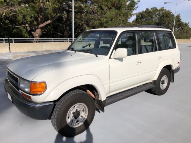 1992 white toyota landcruiser w/factory differential lockers & 7 seat package