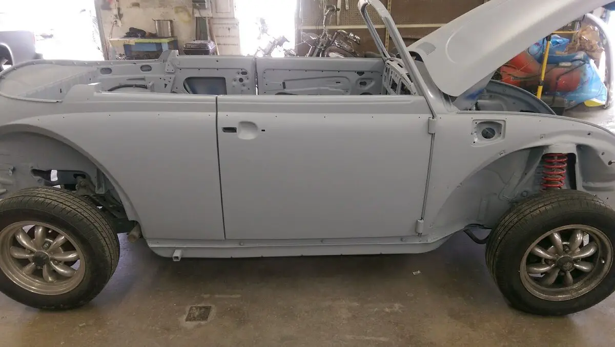 older restored 1972 vw beetle convertible with electric drive train