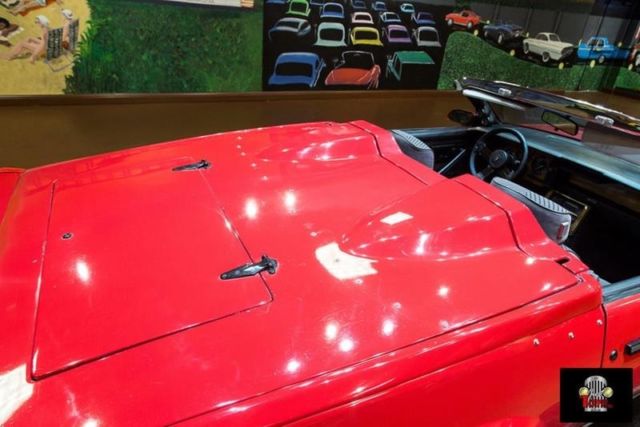 red chevrolet camaro with 3,000 miles available now!