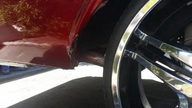 2 door fastback, candy apple red, chromed motor, front disk brakes, black interi