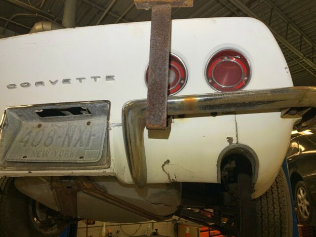 1969 corvette convertible, 2 tops,300/350 4spd 41k mi 1 owner since 71 need res