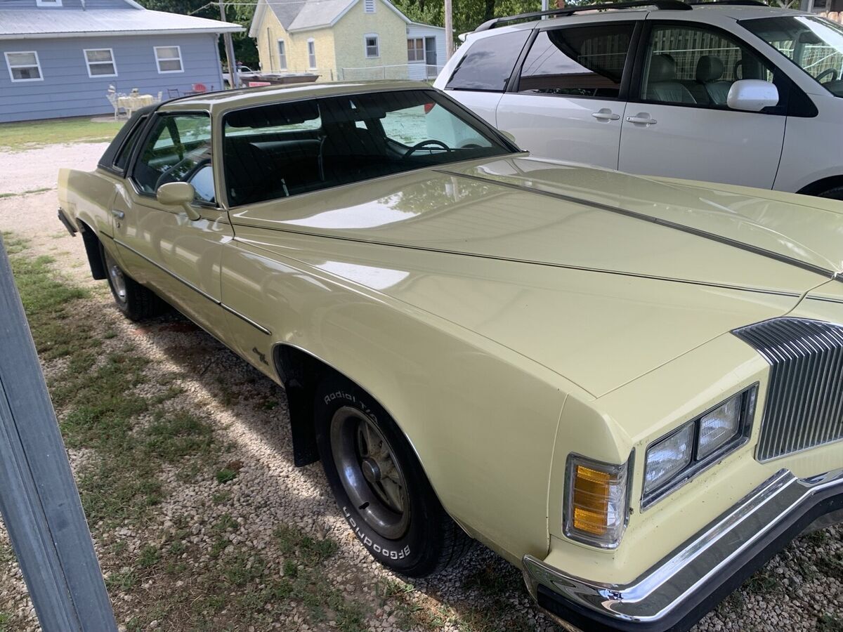 1976 pontiac grand prix coupe yellow sj