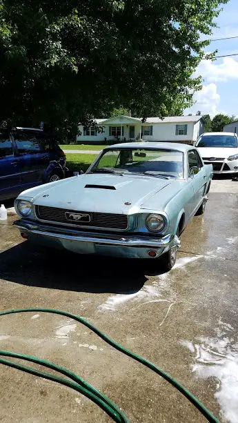 blue 1965 mustang coupe