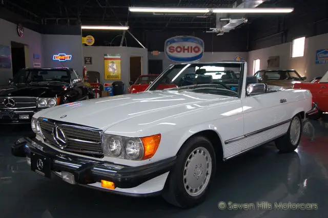 only 61,145 original miles, beautiful condition, artic white/blue, both tops