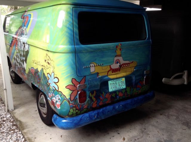 1970 vw double-door panel bus. beatles & herbie & grateful dead paint scheme