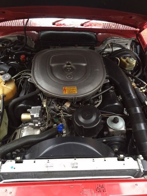 560sl red convertible roadster