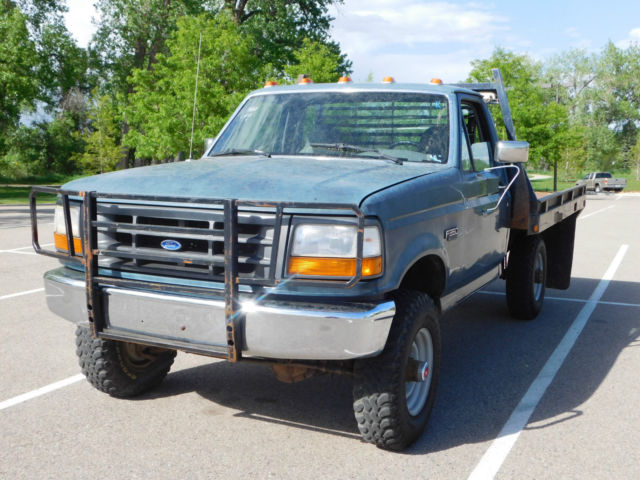 flatbed,farm,ranch,tow,haul,welding,landscape,snow plow,work,srw,8-lug,manual,mt