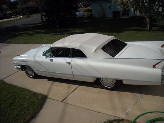 1960 cadillac convertible ,series 62, vintage, antique auto,white