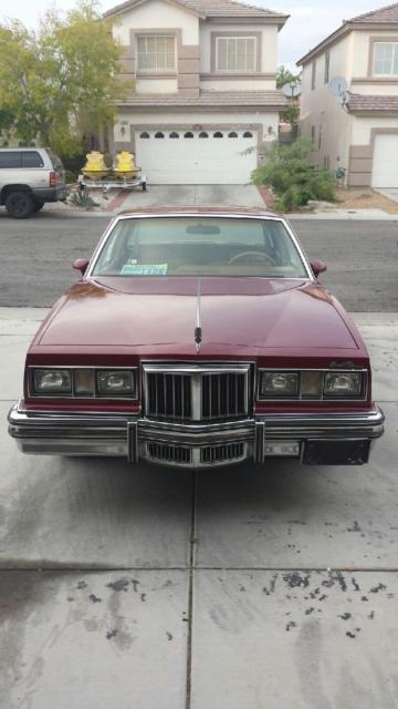 maroon 1978 pontiac grand prix
