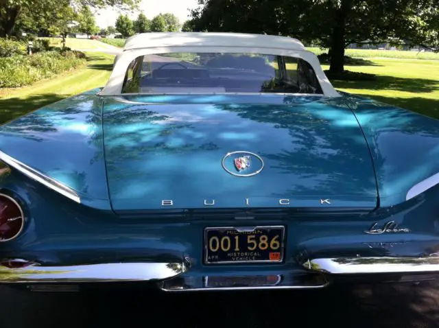 1960 turquoise buick lasabre convertible