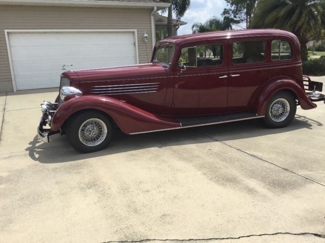 1934 buick model 67, red 4dr. street rod 502 ram jet