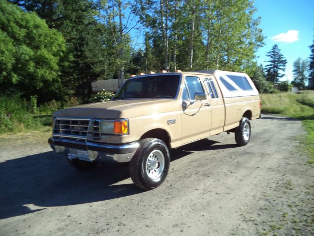 1987 ford f250 xlt lariat ext.cab 4x4 diesel.rust free,adult owned.nice & clean