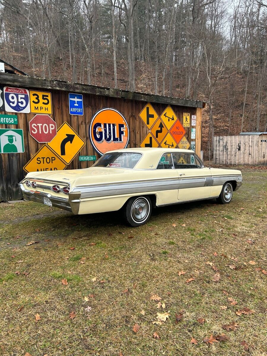 1962 oldsmobile starfire coupe yellow rwd automatic