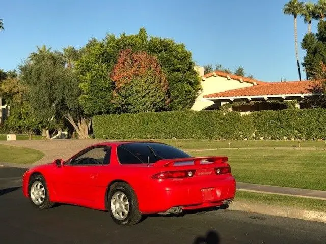 red mitsubishi 3000 gt with 106,000 miles available now!