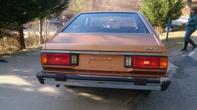 1980 datsun 510 hatchback sedan. clean low miles