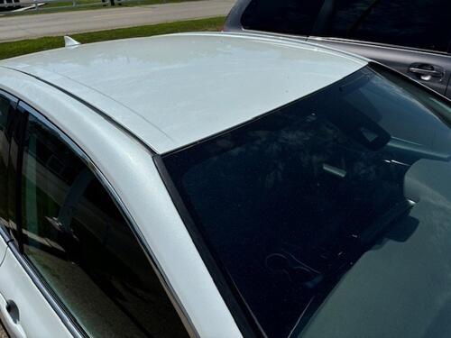 2022 toyota camry hybrid xle with 35,241 miles in wind chill pearl exterior color