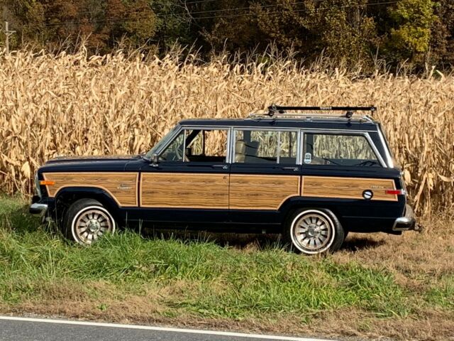 jeep grand wagoneer - desirable blue exterior w/ tan interior