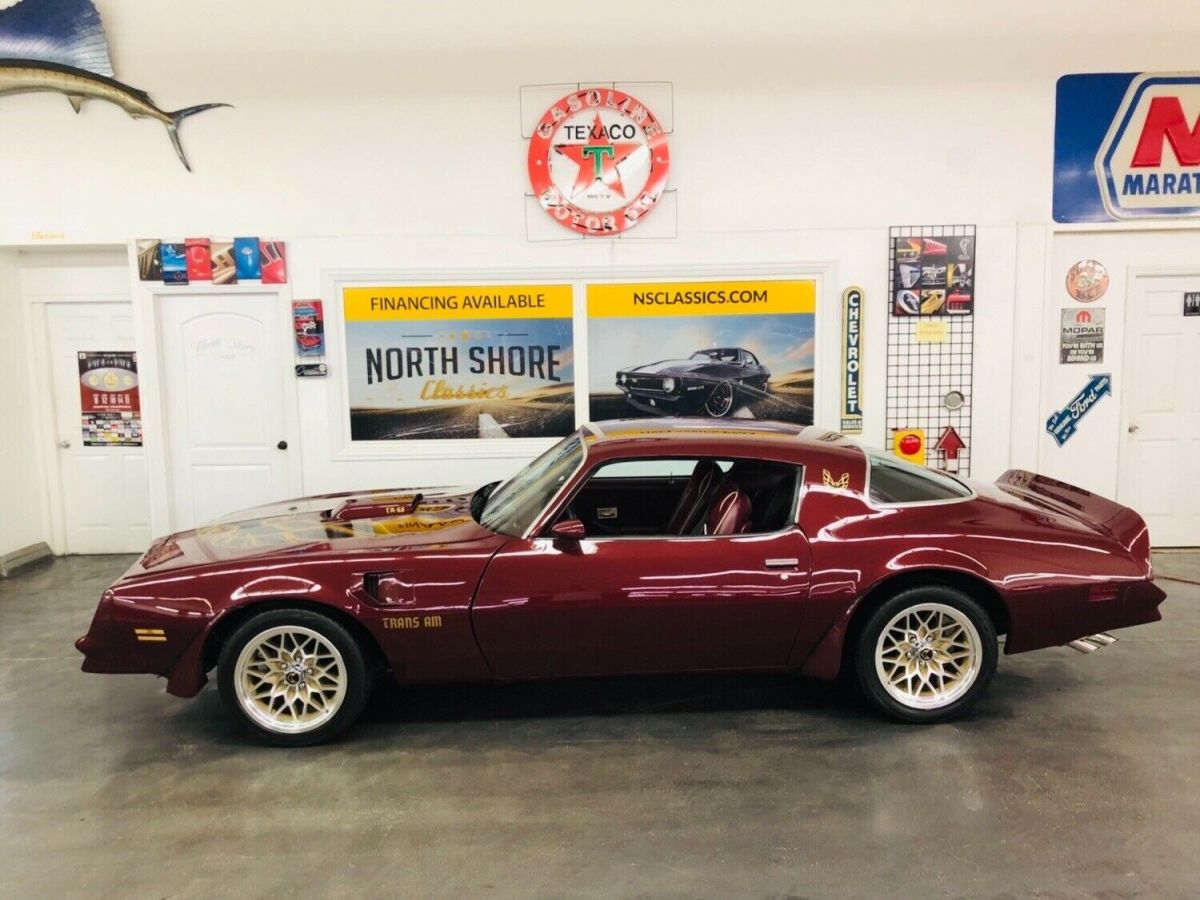 burgundy/maroon pontiac trans am with 38 miles available now!