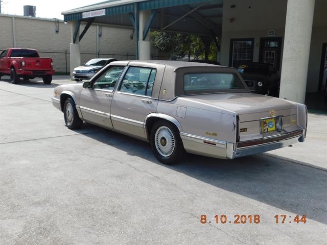cadillac deville bronze with 60,764 miles, for sale!