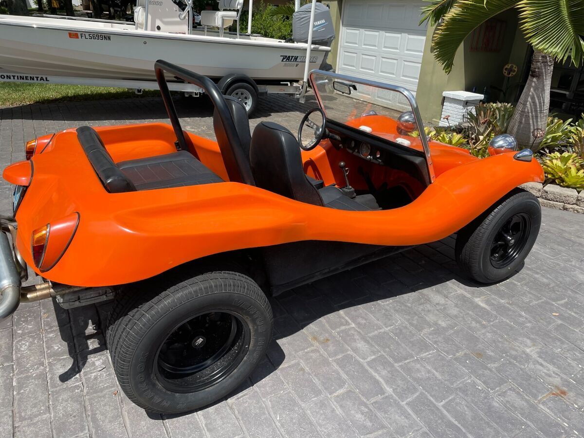 4 seat convertible, rollbar, 4 speed, wide rear tires comes with a new baja top