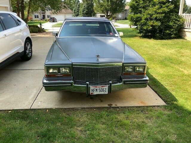 1988 cadillac brougham academy grey with prima cloth dark red seats