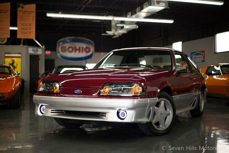 5-speed, fantastic condition, low miles electric red /opel gray priced to sell!!