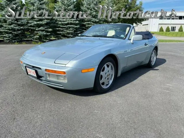 1990 blue metallic convertible 5 speed low miles great summer driver