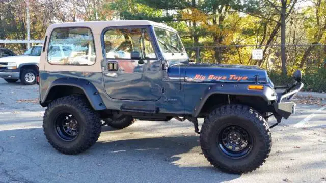 frame off restored monster lifted jeep 4x4 show winner never off-road