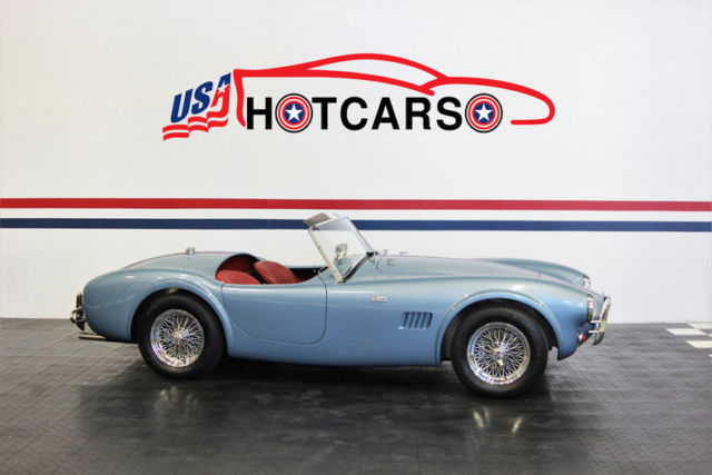 recently completed shelby cobra in stunning princess blue with red interior!