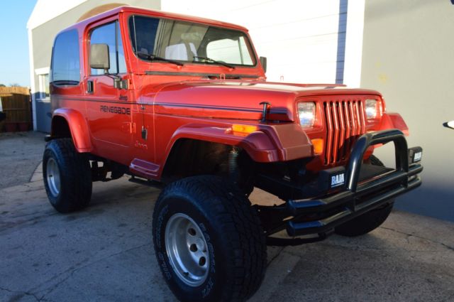 restored jeep wrangler with renegade decals, yj very nice look!!!