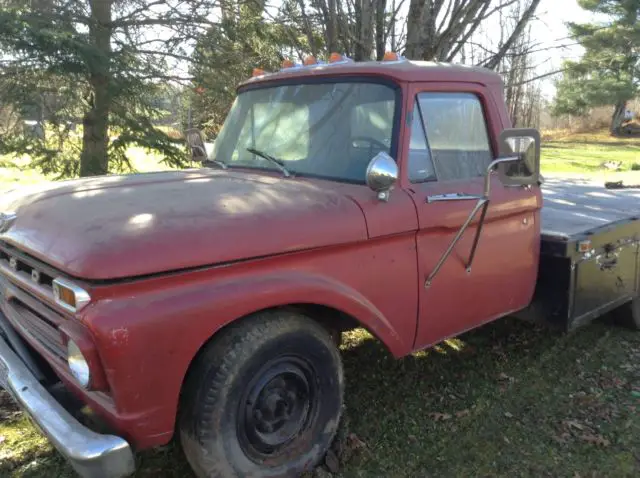 vintage 1966 red ford 1-ton flatbed pickup truck