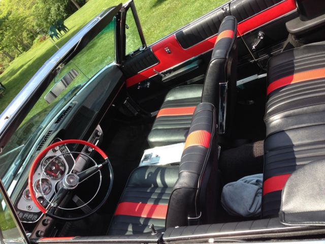 beautiful black convertible with factory big block and air conditioning