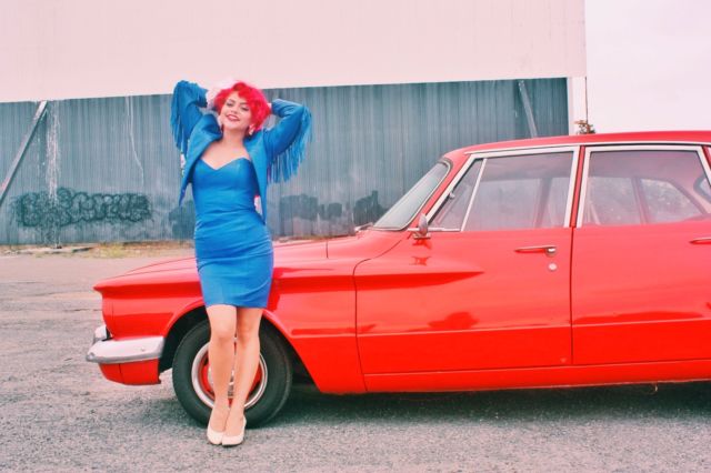 1960 plymouth valiant red 4 door sedan